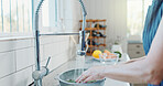 Hands, woman and washing vegetables for kitchen hygiene, food safety or dirt removal for cooking. Water, person or rinse ingredients at home faucet for meal prep, fresh produce or bacteria prevention