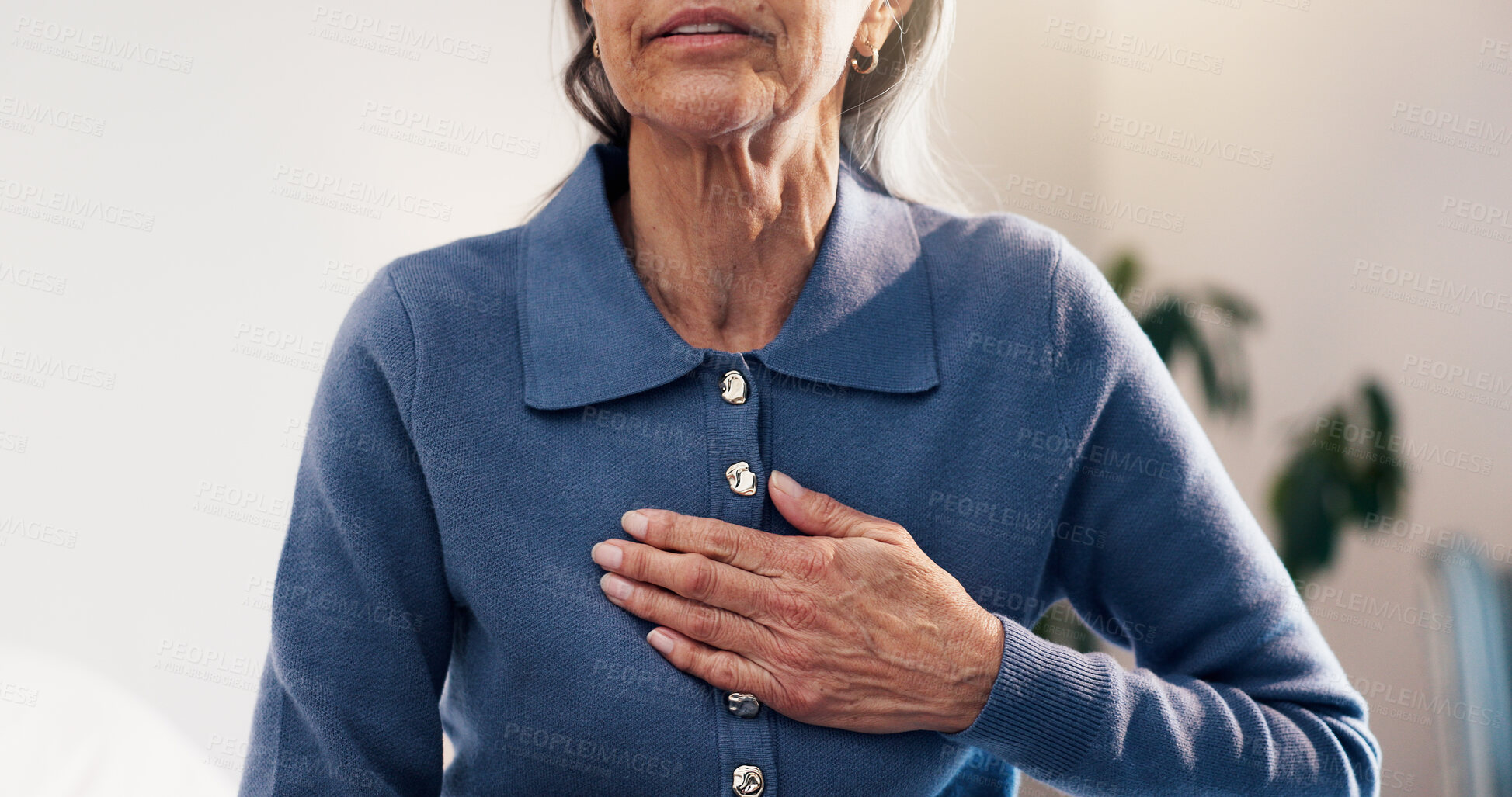 Buy stock photo Senior, woman and hands in retirement home with chest pain, heartburn symptoms and medical problem. Uncomfortable, elderly person and acid reflux in house with indigestion, illness and health issue.