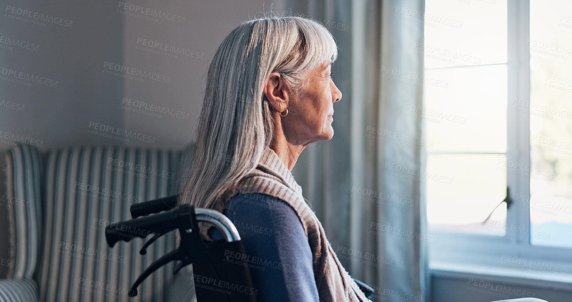 Buy stock photo Thinking, wheelchair and window with senior woman in retirement home for memories or nostalgia. Flare, remember and old person with disability in living room for contemplation, ideas or morning view