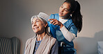 Caregiver, grooming and old woman in retirement home with brush, support or help for beauty routine. Volunteer service, elderly person and happy in house with hair care, assisted living and kindness.