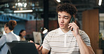 Businessman, laptop or consultant with phone call in office for negotiation, discussion or chat. Man, employee or agent talking with client, computer or smartphone for business conversation or advice