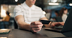Businessman, hands and credit card with laptop in office for online shopping, purchase or payment. Man, employee or shopper with debit or computer for ecommerce, wireless transaction or banking app
