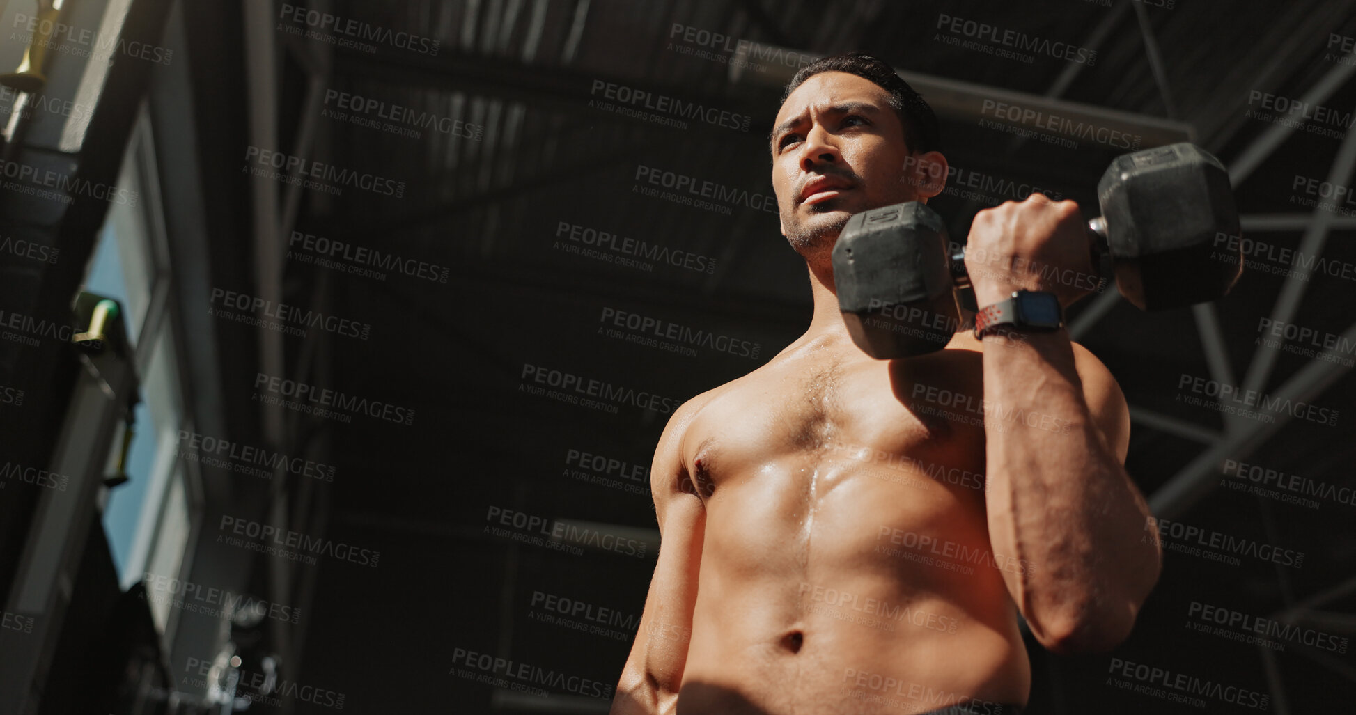 Buy stock photo Thinking, gym and bodybuilder man with dumbbells or weights for training, exercise and self care. Iron, workout and person with health club membership for fitness, strong arm muscle and wellness