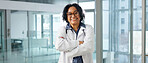 Portrait, woman and doctor at hospital with smile, career pride and about us for medical opinion. Happy, person and crossed arms in workplace with ambition, positive attitude and healthcare services