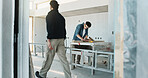 Construction, walking and men in building for remodeling, renovation project and architecture. Contractor, team and people with ladder for infrastructure, property development and site maintenance