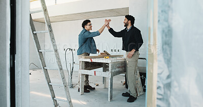 Buy stock photo Construction, high five and men in building for renovation, remodeling project and planning. Architecture, team and people with support for infrastructure progress, property development and success