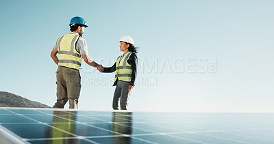 Buy stock photo Solar panel, people or handshake on rooftop for clean energy deal, successful handover or agreement. Space, technician and investor shaking hands for utility contract, PV installation and completion