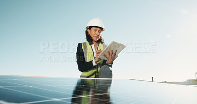 Buy stock photo City, rooftop and woman with tablet for solar panel installation, inspection and planning for energy. Engineering, typing and person on tech for grid maintenance, renewable electricity and power