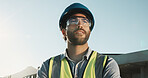 Technician, man and thinking at construction site with PPE, idea and vision for property development. Contractor, electrician and person outdoor with safety gear, reflection or decision for building.