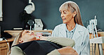 Women, dentist and patient in clinic for dental treatment, tooth extraction or appointment. Female person, orthodontist or sore mouth on chair for teeth cleaning or oral healthcare in dentistry