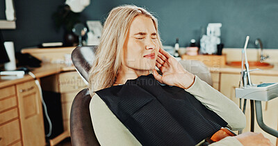 Buy stock photo Woman, toothache and pain in dentist for cavity, oral infection or tooth extraction in clinic. Female person, patient or sore jaw with teeth ache for root canal, dental treatment or gum disease