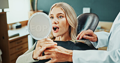 Buy stock photo Woman, happy and wow with mirror for oral hygiene, results and teeth whitening at dental clinic. Smile, patient and healthcare at orthodontist for tooth cleaning, veneers and dentist implants