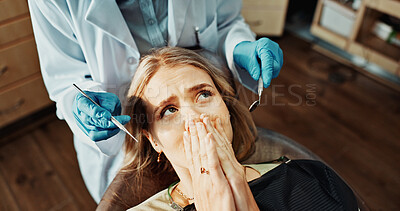 Buy stock photo Patient, anxiety and woman with dentist in office, dental health or frightened of medical procedure. Clinic, fear and person with stress for teeth exam, above and checkup for oral care and wellness