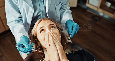 Buy stock photo Patient, fear and woman with dentist in appointment, dental care or frightened of medical procedure. Clinic, above and person with stress for teeth exam, scared and checkup for oral health and help