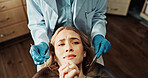 Patient, worried and woman with dentist in office, dental health or frightened of medical procedure. Clinic, above and person with stress for teeth exam, scared and checkup for oral care and help