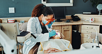 Buy stock photo Clinic, woman and dentist with face mask for consulting, oral hygiene and medical service. Healthcare, patient and orthodontist with protection for dental care, cavity removal and teeth cleaning