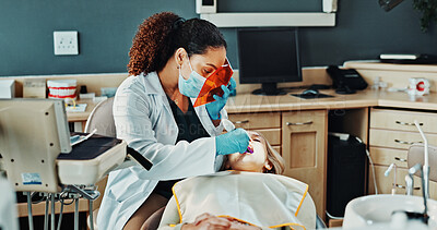 Buy stock photo Clinic, patient and dentist with face mask for consulting, oral hygiene and medical service. Healthcare, woman and orthodontist with protection for dental care, cavity removal and teeth cleaning