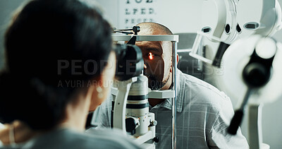 Buy stock photo Optometry, man or slit lamp for eye exam, cornea infection or diagnostic for ocular health. Vision, optometrist or mature patient with light in clinic for glaucoma test, iris inspection or healthcare