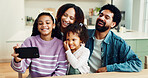 Family, happy and relax with selfie in home for photography, holiday memory or weekend together. Mom, dad and kids with smile, picture or capture moment for bonding or social media post in house