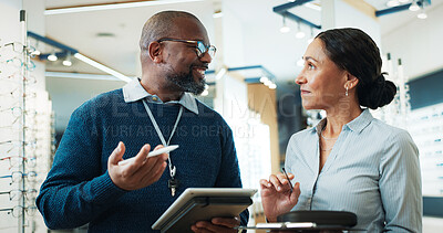 Buy stock photo Optometry, tablet and smile with people in store for  consulting, glasses advice and discussion. Lens fitting, online prescription and eye care with client and optometrist in clinic for ophthalmology