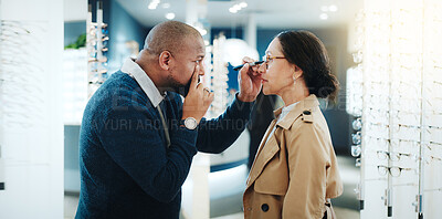 Buy stock photo Man, optometrist and eye test with customer in store for examination or lens prescription. Male person, client or checking vision with spectacles or frame for eyesight, checkup or optometry in shop