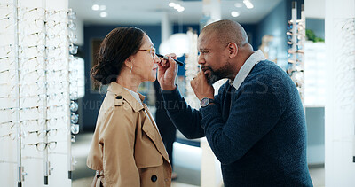 Buy stock photo Man, optometrist and eye exam with customer in store for optic checkup or lens prescription. Male person, client or checking vision with spectacles or frame for eyesight, test or optometry in shop