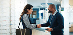 Businessman, optometrist and handshake with customer for thank you, glasses or deal in store. Man, sales representative or shaking hands in optometry shop with spectacles or smile for vision or sight