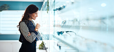 Buy stock photo Glasses, choice and optometry with woman in store for prescription, eye care or spectacle option. Space, ophthalmology and lens shopping with mature person in clinic for vision health and optical