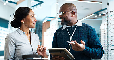 Buy stock photo Optometry, tablet and discussion with people in store for  consulting, glasses advice and help. Lens fitting, online prescription and eye care with client and optometrist in clinic for ophthalmology