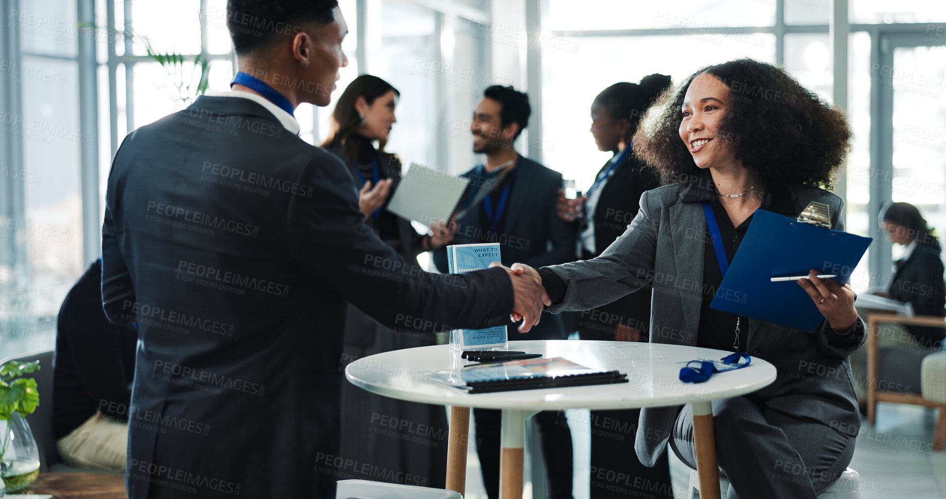 Buy stock photo Business people, seminar or shaking hands for introduction, meeting or greeting with smile. Conference, happy or handshake for welcome, hello or innovation event with clipboard for guest registration