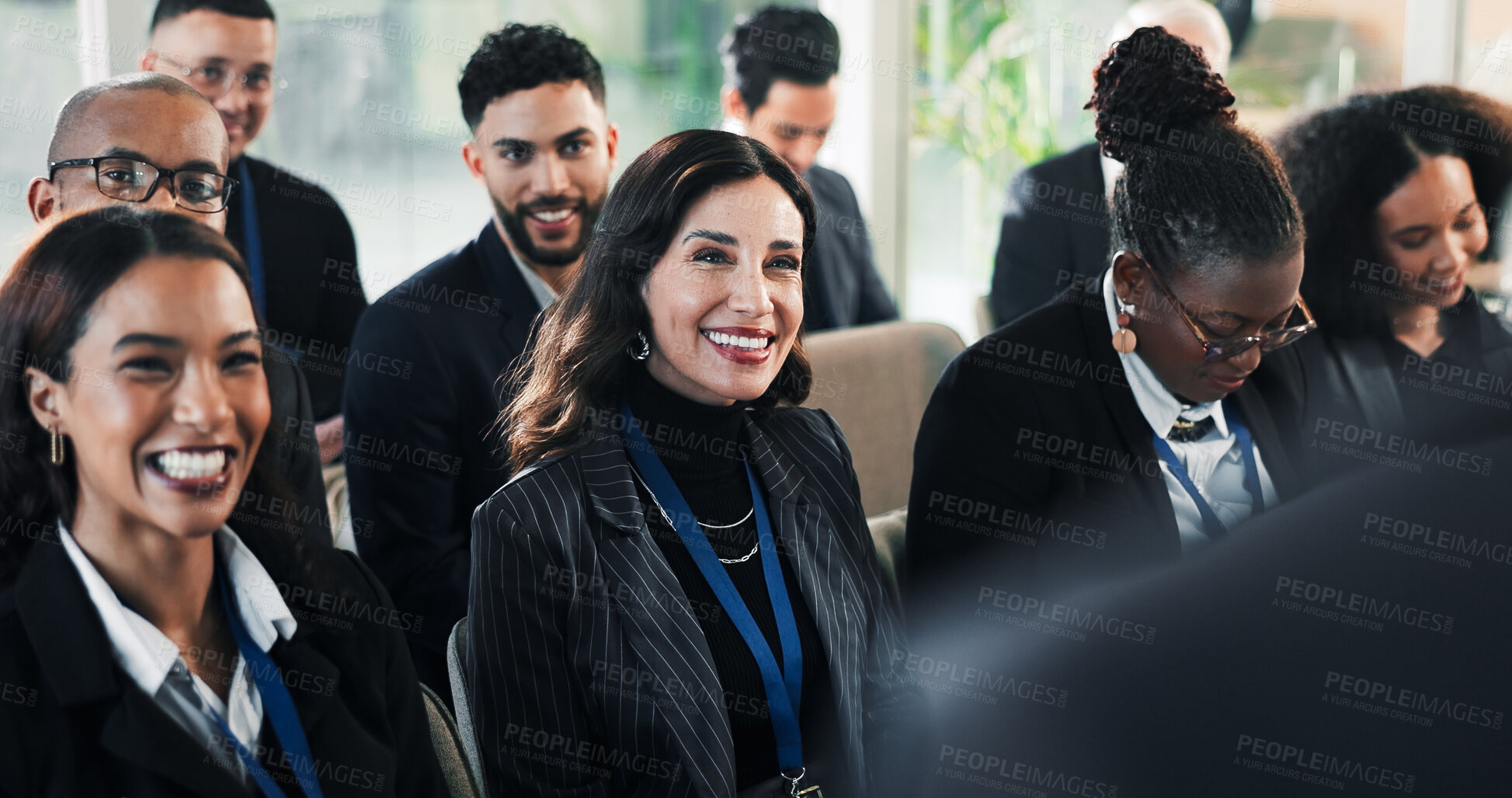 Buy stock photo Presentation, training or happy woman in office with attention, learning or budget review at event. Seminar, crowd or finance advisor with insight, target coaching or engagement in corporate literacy