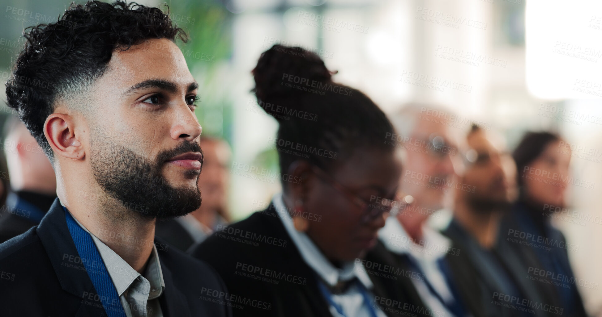 Buy stock photo Man, attention and audience in conference for business, upskill workshop and smile for feedback. Employee, crowd and opportunity in seminar for training, information and happy for career development
