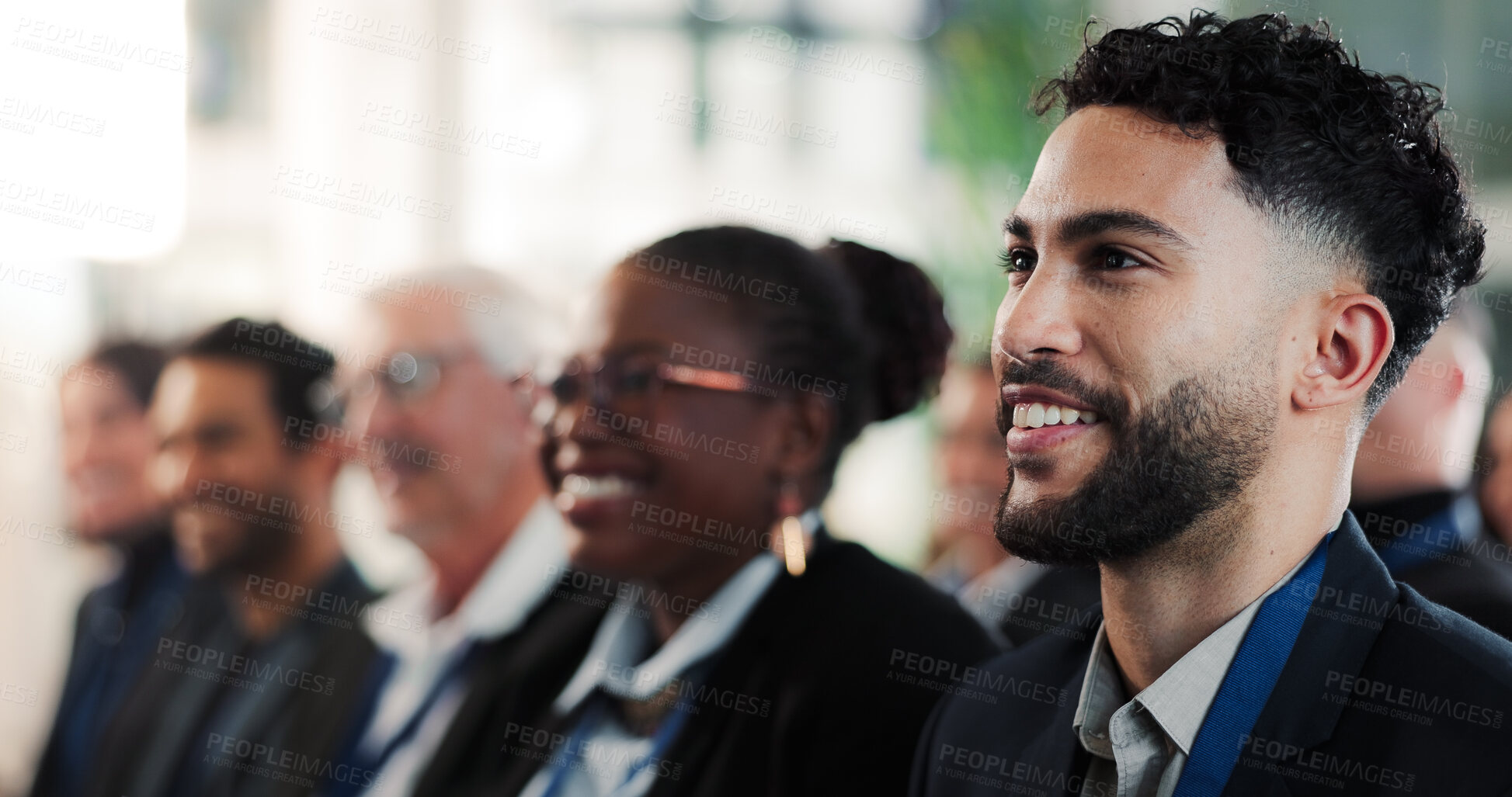 Buy stock photo Man, smile and audience in conference for business, upskill workshop and attention in course. Employee, crowd and opportunity in seminar for training, information and happy for career development