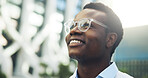 City, smile and businessman with glasses, thinking and contemplating career decision and reflection. Outdoor, thoughts and black person with eyewear, low angle and happy for job opportunity or travel