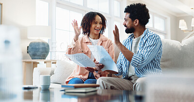 Buy stock photo Finance, documents and happy couple with high five in home for budget success or winning together. Excited, man and woman with smile or paperwork for financial investment, insurance or bills in house