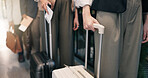 Hands, people and waiting at airport with suitcase, checkin and flight departure for travel. Business, employees or queue at terminal with luggage, passport control and border security of immigration