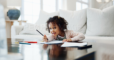 Buy stock photo Drawing, paper and portrait of girl child in living room of home for creative expression. Artistic, learning and writing with happy kid in apartment for development, future or growth on weekend