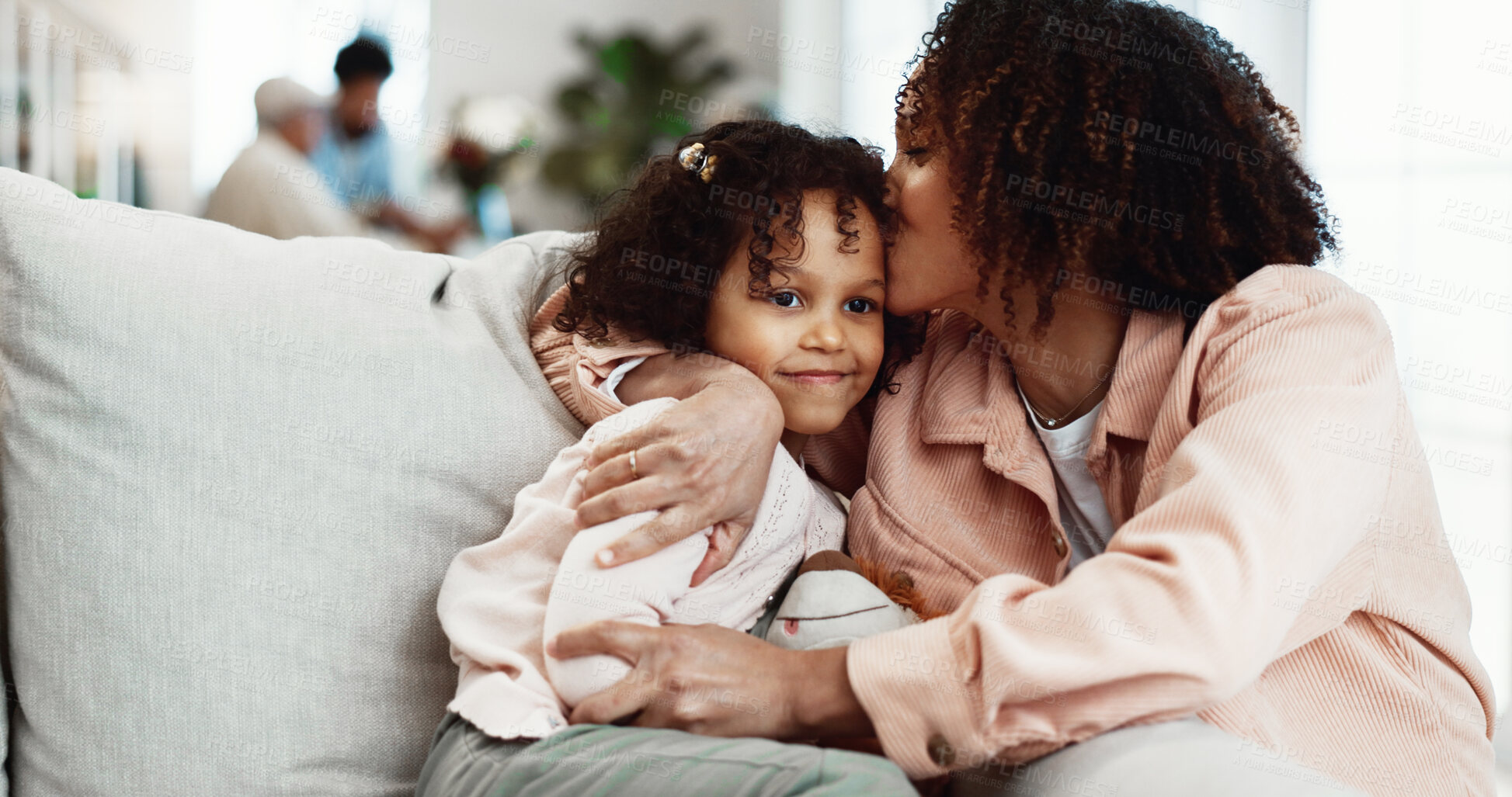 Buy stock photo Mother, hug and kiss child in house with smile, love and connection for bonding together on weekend. Happy, woman and embrace daughter in lounge with care, affection and support for family wellness.