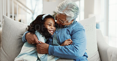 Buy stock photo Happy, grandmother and hug in home with child, family wellness or bonding together for weekend visit. Senior woman, smile and embrace girl grandchild in living room with care, support and affection.