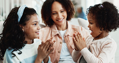 Buy stock photo Children, home and hand clapping game in lounge, family connection and smile with mother on weekend. Siblings, fun and bonding with happy woman, growth or kids playing with fine motor skills in house