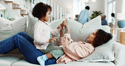 Buy stock photo Happy, mother and playing at house with child, love and fun interaction for bonding together. Woman, playful and daughter in home with childcare, parental care and family connection for weekend break