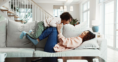 Buy stock photo Fun, mom or kid on sofa with lifting, happy relationship or bonding together for child growth. Childcare, laugh or family in home with game, parenthood or playful connection in childhood development.