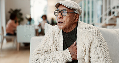 Buy stock photo Senior, man and home with chest pain on sofa for heart attack, hypertension or asthma. Elderly, male person or sore ache with chronic illness or bronchitis for cardiac arrest or high blood pressure