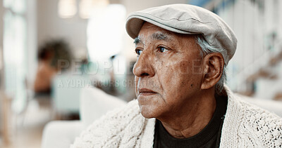 Buy stock photo Thinking, relax and senior man on sofa in home with reflection, nostalgia or reminder of retirement. Serious, lonely and elderly person in living room for planning pension in apartment on weekend.
