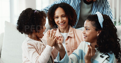 Buy stock photo Children, fun and clapping game in lounge, family connection or smile with parents on break in home. Siblings, love and bonding with happy woman, playing and kids with fine motor skills in house