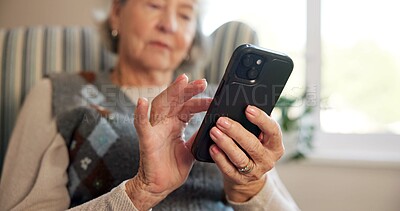 Buy stock photo Phone, hands and senior woman with texting, reading news and mobile app for contact in home. Elderly person, tech and scroll with chat, notification and social network on lounge couch in retirement