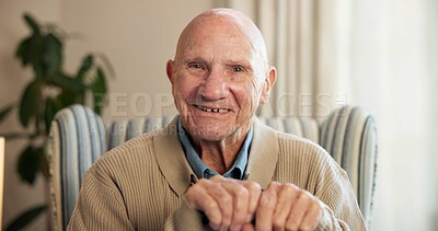 Buy stock photo Portrait, smile and senior man in home to relax for retirement, positive attitude and optimism. Happy, elderly person and resting on chair for wellness, peace and calm at living room in Switzerland