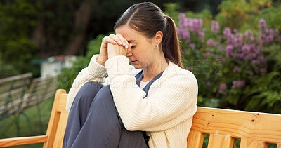 Buy stock photo Unhappy, nurse and woman with anxiety at park, think or contemplating decision with regret in nature. Outdoor, caregiver and person with depression, reflection and remembering bad memories and stress