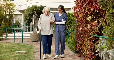 Buy stock photo Nurse, cane and senior woman in outdoor garden for mobility, exercise or support together. Elderly, female person or caregiver helping patient with walking stick for assisted living or balance