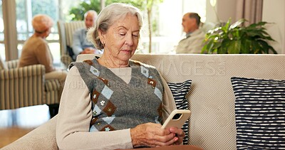 Buy stock photo Phone, typing and senior woman in retirement home with texting, email or reading blog on mobile app. Tech, relax and elderly person with cellphone for chatting on website in living room at house.